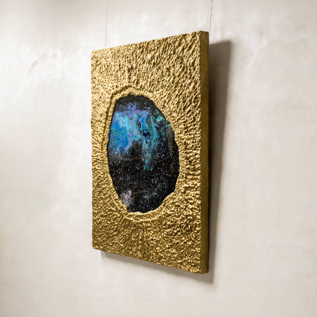 Cosmic Nebula — macro surface detail capturing the luminous interplay of light across the textured metal element finish, evoking the infinite depth of a cosmic nebula.