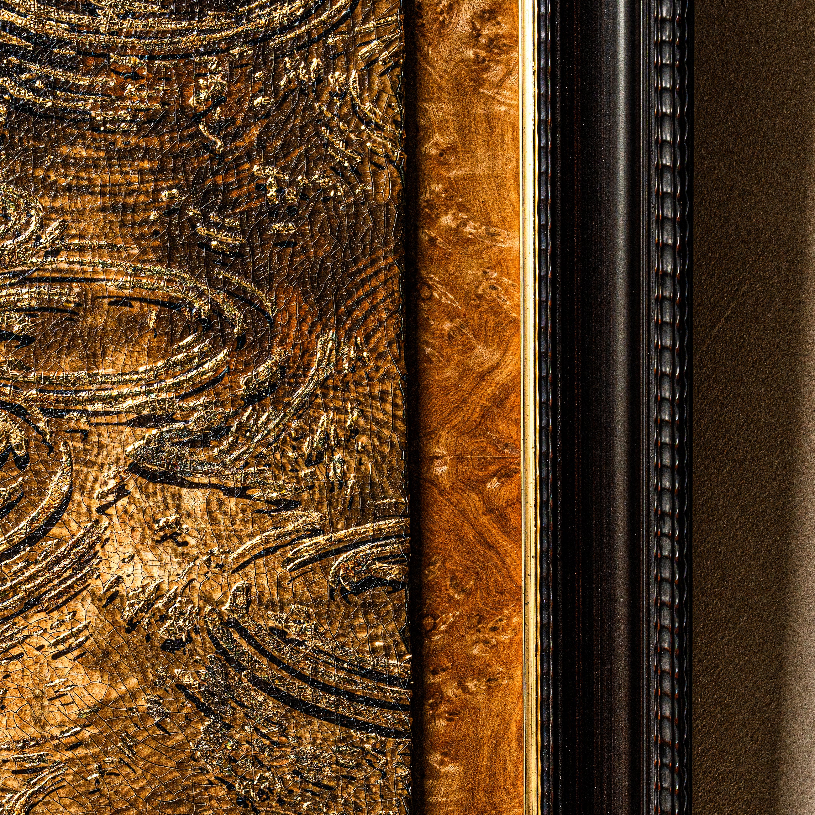 Close-up of Harvest Tide — Patinated Foil, revealing the interleaved craftsmanship of hand-worked ripple relief and natural crackle ground, alongside sixteen stages of high-temperature firing that produce the foil's graduated tonal coloring.