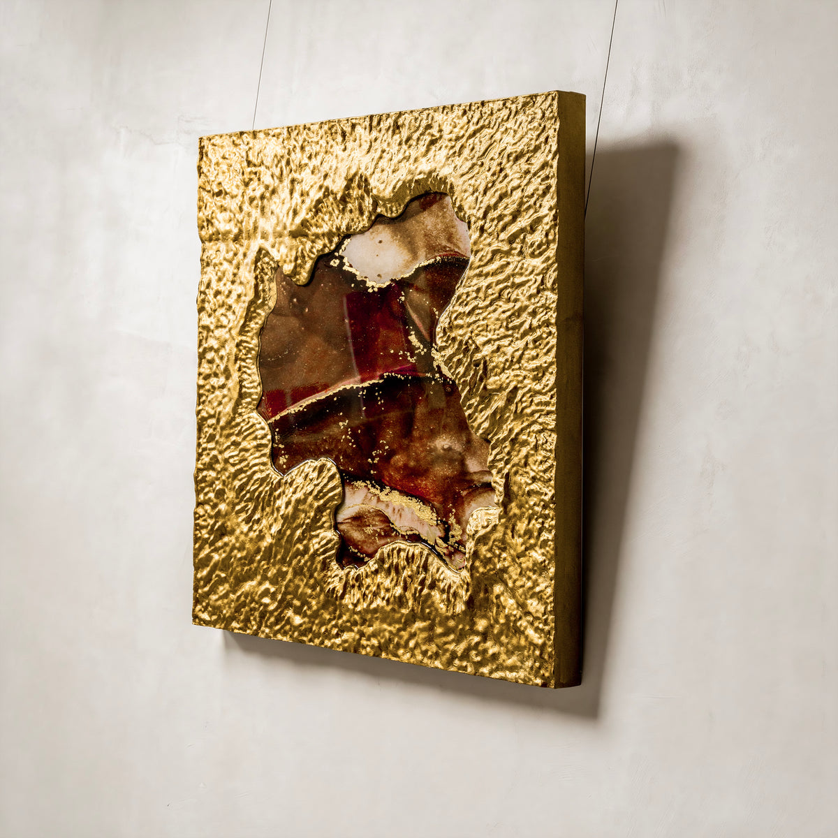 Mirror of Universe-brown — macro surface detail capturing the luminous interplay of light across the textured metal element finish, evoking the reflective stillness of a cosmic mirror.