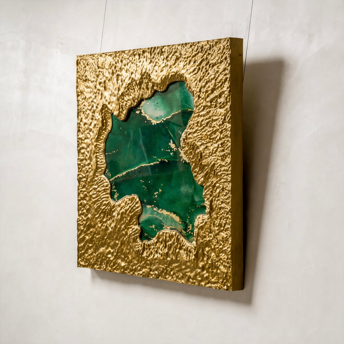 Mirror of Universe-green — macro surface detail capturing the luminous interplay of light across the green textured metal element finish, evoking the reflective stillness of a cosmic mirror.