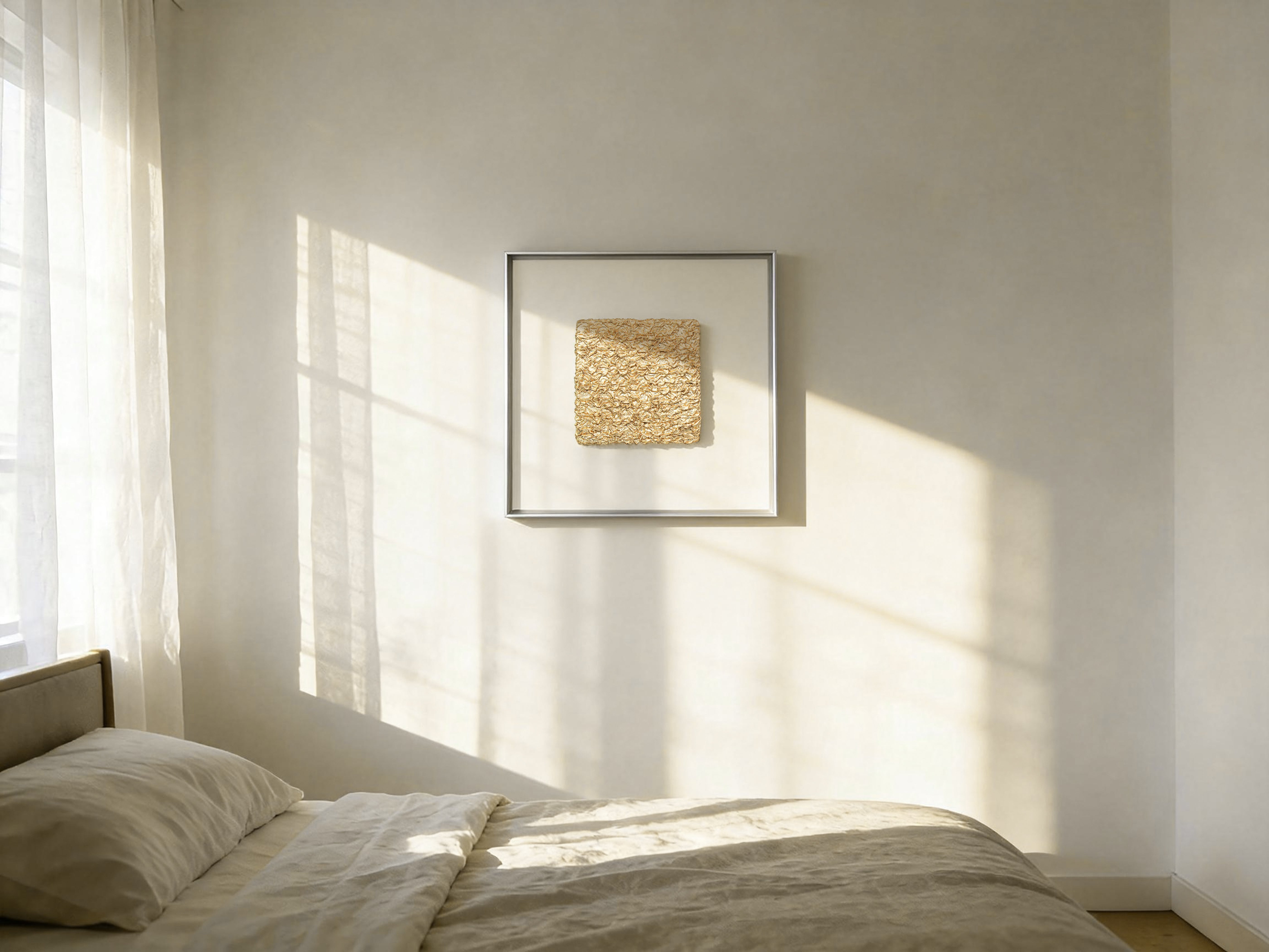 Shan — Gilded Foil · Aura Frame displayed in an interior setting, its earth element energy and dual-reading mineral texture — mountain ridgelines and cracked earth fissures sharing the same surface — bringing the grounded presence of wealth held inside the earth to the wall.