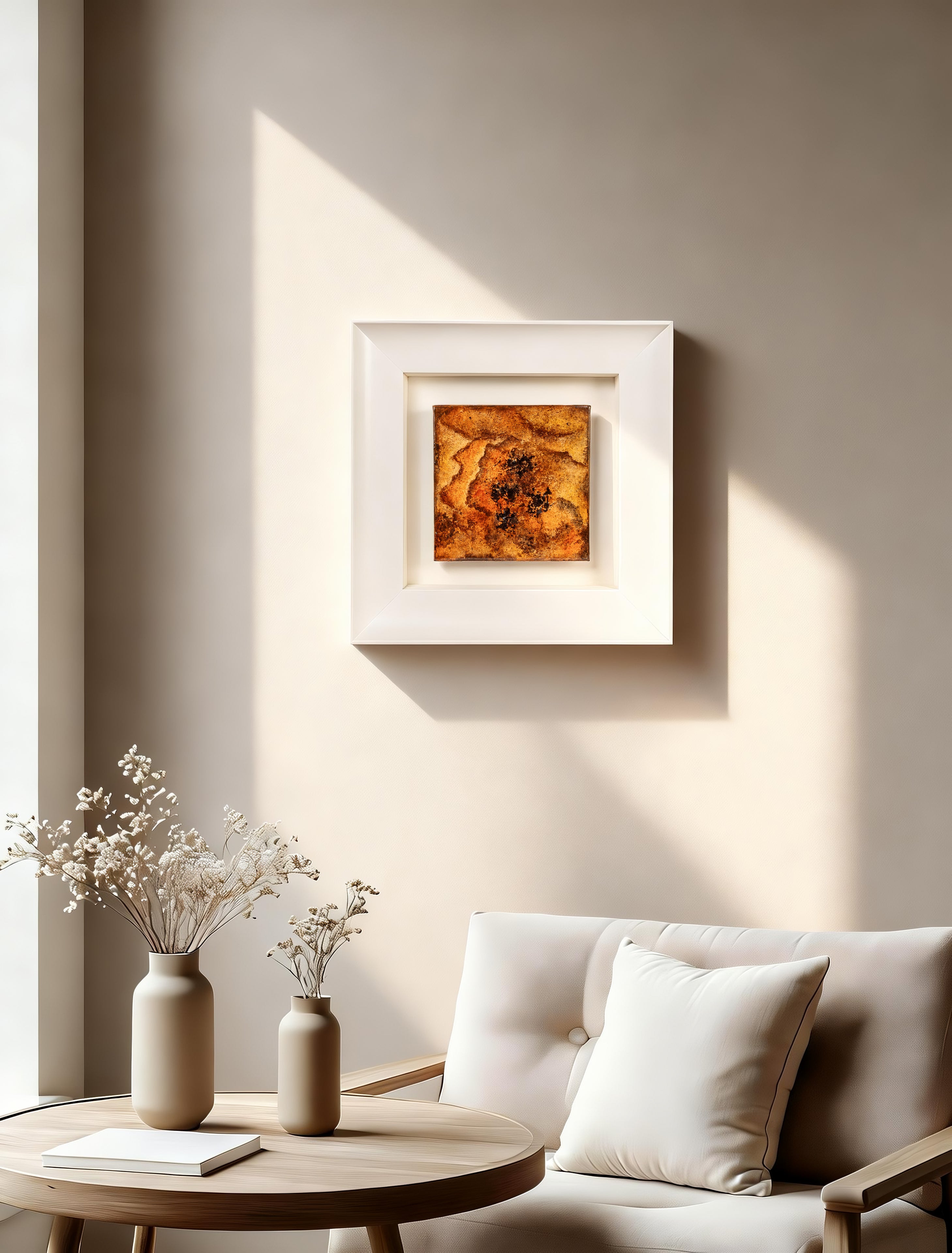 Peony — Mineral Paint · Aura Frame displayed in an interior setting, its fire element energy and richly layered 3D mineral texture — warm orange and cream tones fusing outward like petals and flame — bringing sculptural depth and organic warmth to the wall.