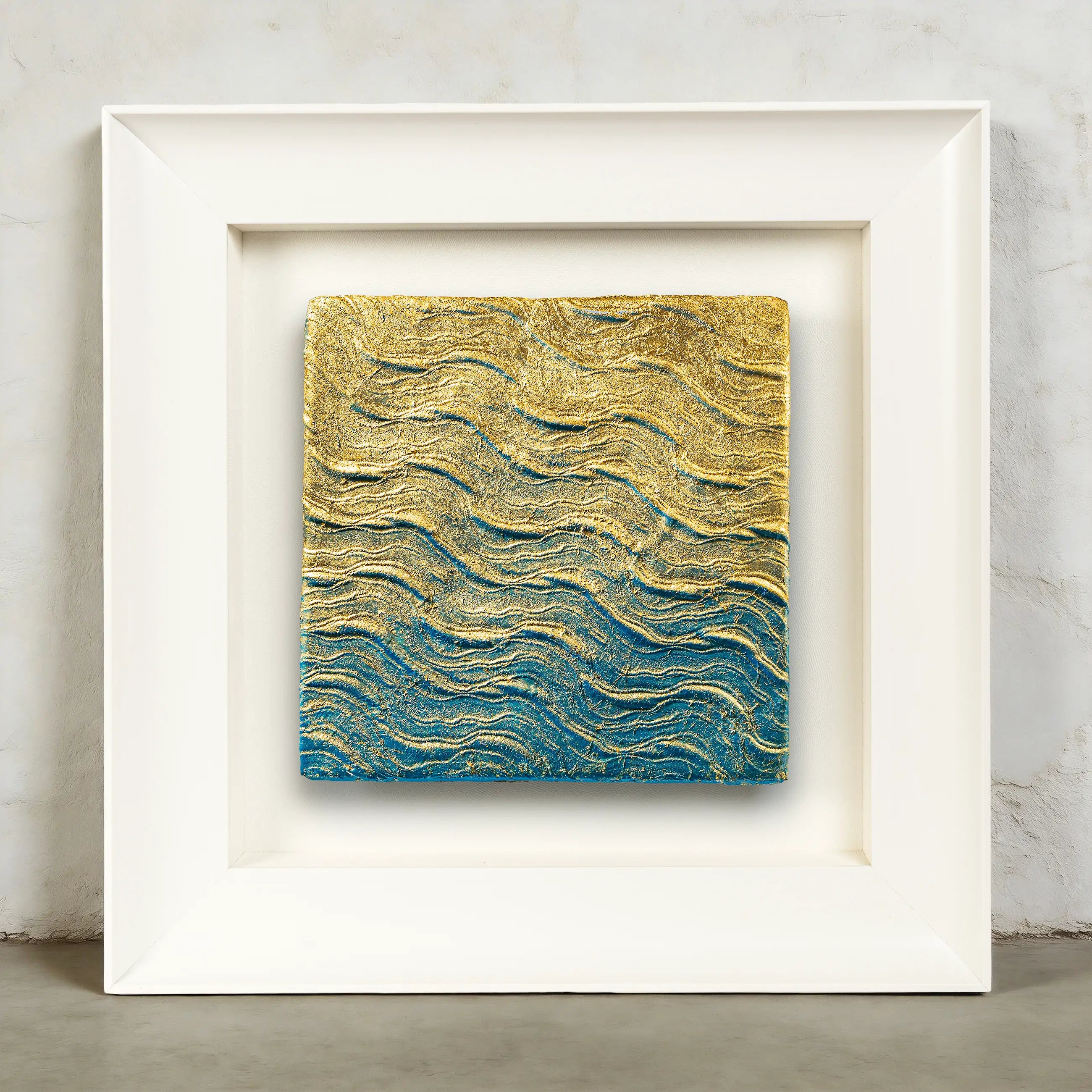 Full view of a water element wall art with hand-built 3D wave ridge mineral texture, Eastern Jin Dynasty gilded foil catching light at every crest while deep blue mineral pigment holds still in the grooves — wave upon wave, layered and alive.