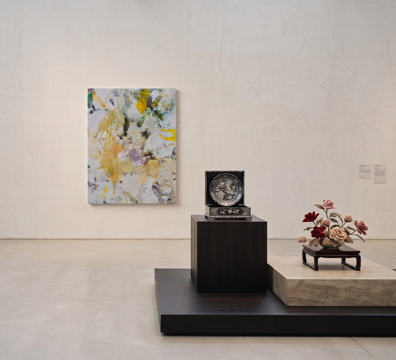 Artworks and handcrafted objects displayed together